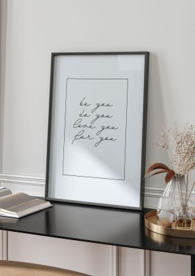 An unframed print of be you love you script quote in typography in grey and black accent colour