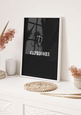 An unframed print of minimalist horoscope star sign series capricorn graphical in black and white accent colour