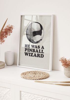 An unframed print of pinball wizard the who lyric halftone music in typography in beige and black accent colour