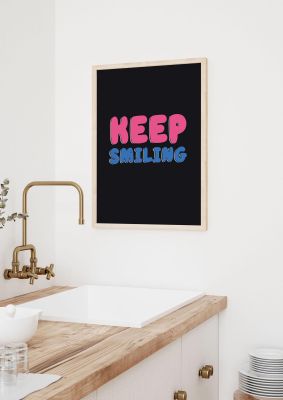 An unframed print of keep smiling bubble quote in typography in black and pink accent colour