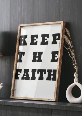 An unframed print of keep the faith quote in typography in grey and black accent colour