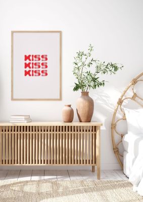 An unframed print of kiss kiss kiss graphical in typography in grey and red accent colour