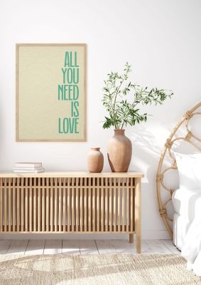 An unframed print of all you need is love in typography in beige and green accent colour